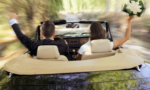 bride-groom-driving-wedding-car-scaled.jpg